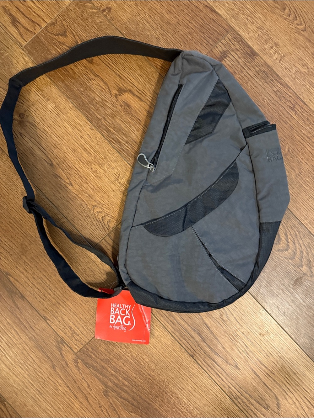 Crossbody Sling in Gray healthy back bag